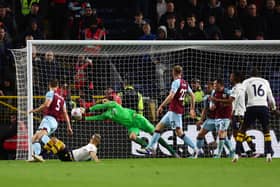 BURNLEY, ENGLAND - APRIL 06: Nick Pope of Burnley saves an overhead kick from Richarlison of Everton during the Premier League match between Burnley and Everton at Turf Moor on April 06, 2022 in Burnley, England. (Photo by Clive Brunskill/Getty Images)