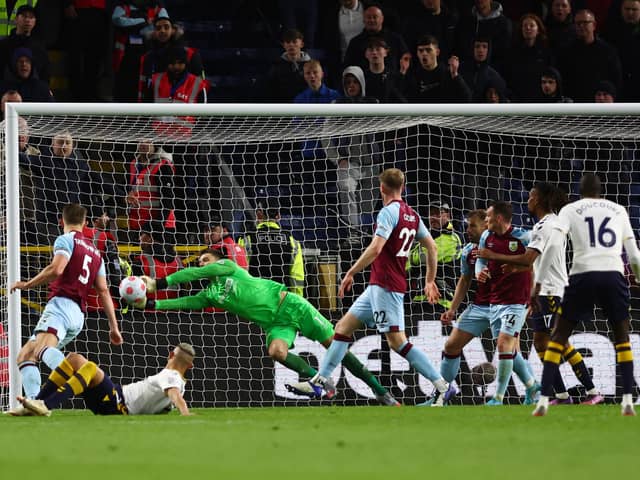 BURNLEY, ENGLAND - APRIL 06: Nick Pope of Burnley saves an overhead kick from Richarlison of Everton during the Premier League match between Burnley and Everton at Turf Moor on April 06, 2022 in Burnley, England. (Photo by Clive Brunskill/Getty Images)