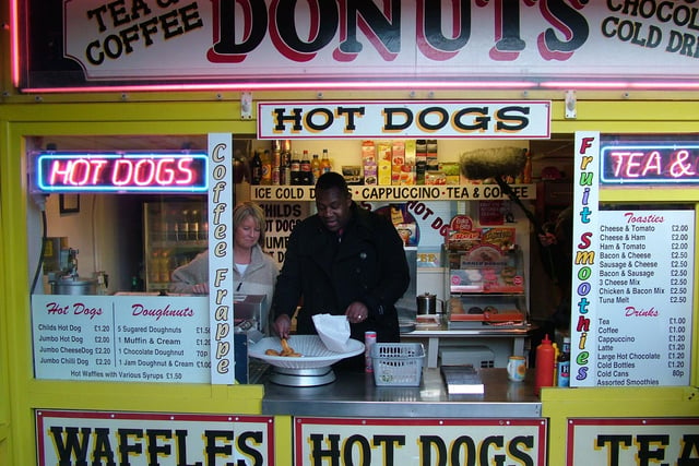 Laura Giles: "The sweet smell of candy floss and doughnuts with the smell of burgers. This photo to illustrate is dug from our archives from when Lenny Henry made donuts with Shirley Cantell at South Pier during filming for Lenny's Britain in 2006