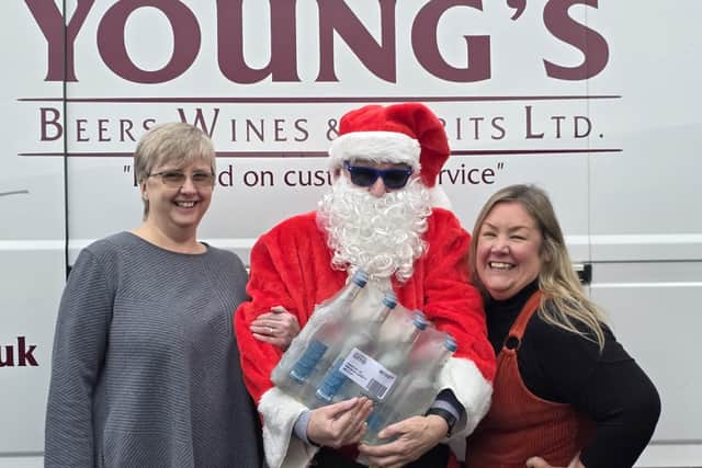 Steve Tuck (Santa) of Wenlock Spring with Cheryl Hobson and Gilly Rodgers from Young’s Beers, Wines & Spirits