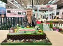 Karen Wright and the cake she made in honour of design awards