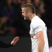 BURNLEY, ENGLAND - FEBRUARY 23: Spurs defender Eric Dier has words with the assistant referee during the Premier League match between Burnley and Tottenham Hotspur at Turf Moor on February 23, 2022 in Burnley, England.  (Photo by Stu Forster/Getty Images)