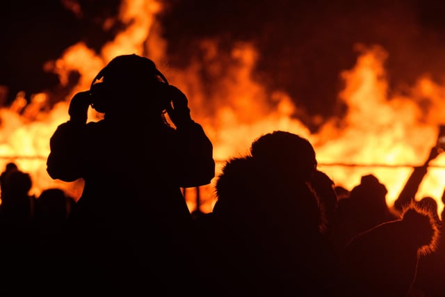 The bonfire at Towneley Park as visitors gather round to keep warm. Photo: Kelvin Stuttard