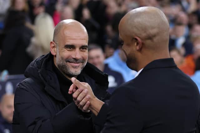 MANCHESTER, ENGLAND - MARCH 18: Pep Guardiola, Manager of Manchester City, shakes hands with Vincent Kompany, Manager of Burnley, prior to the Emirates FA Cup Quarter Final match between Manchester City and Burnley at Etihad Stadium on March 18, 2023 in Manchester, England. (Photo by Clive Brunskill/Getty Images)