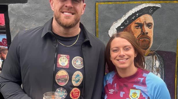 Former NFL star JJ Watt, a Burnley FC investor, with Justine Bedford, of The Royal Dyche.