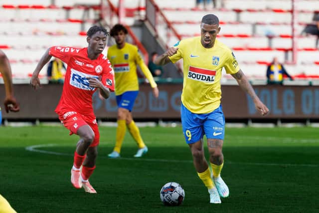 Kortrijk's Habib Keita and Westerlo's Lyle Foster fight for the ball during a soccer match between KV Kortrijk and KVC Westerlo, Saturday 22 October 2022 in Kortrijk, on day 14 of the 2022-2023 'Jupiler Pro League' first division of the Belgian championship. BELGA PHOTO KURT DESPLENTER (Photo by KURT DESPLENTER / BELGA MAG / Belga via AFP) (Photo by KURT DESPLENTER/BELGA MAG/AFP via Getty Images)