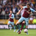 BURNLEY, ENGLAND - MAY 07: Wout Weghorst of Burnley battles for possession with Calum Chambers of Aston Villa during the Premier League match between Burnley and Aston Villa at Turf Moor on May 07, 2022 in Burnley, England. (Photo by Gareth Copley/Getty Images)