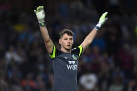 BURNLEY, ENGLAND - AUGUST 11: James Trafford of Burnley gestures during the Premier League match between Burnley FC and Manchester City at Turf Moor on August 11, 2023 in Burnley, England. (Photo by Michael Regan/Getty Images)