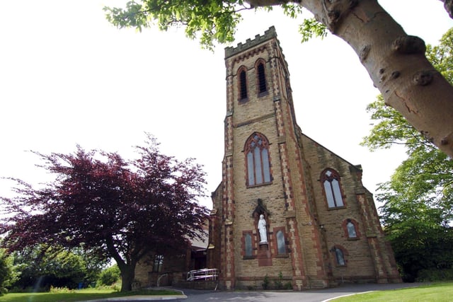 Sacred Heart Church, Thornton, which is on the Historic England At-Risk Register because "suspected inclusion of now corroding iron locating dowels within base of tracery mullions is causing widespread failure".