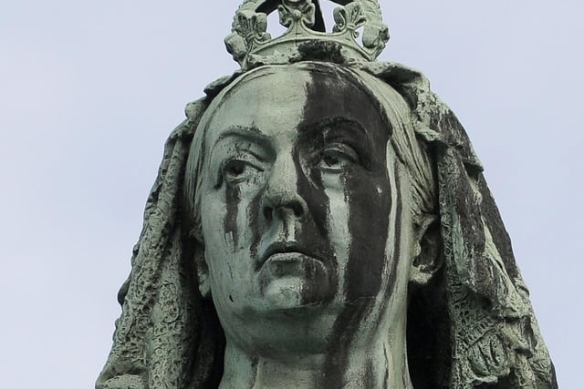 The face of Queen Victoria on the memorial statue in Dalton Square, Lancaster. Historic England says the statue, which dates from 1906, has problems include corroding bronze, graffiti, and staining of the stonework and pointing. However, the watchdog points out that "the local authority hopes to conserve the memorial".