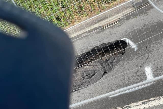 Motorist Ian Walker captured this image of the sinkhole in Burnley Road, Cliviger when it appeared overnight