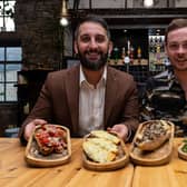 Frankie Musso and Brad Hensby-Musso, co-owners of Mangia Pasta, with a selection of their food. Photo: Kelvin Stuttard