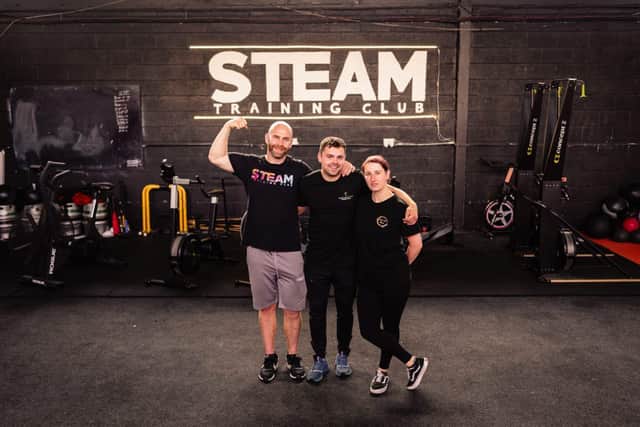 Anthony Tibbs, Marcus Morris and Sarah Cole during their fundraiser in memory of Laura Nuttall at Steam Training Club in Burnley. Credit: Tom Lally