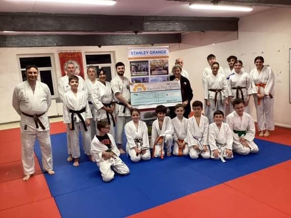 Members of a Colne judo club, based at the Kanokwai Budo Renmei Dojo in Winewall, took on a sponsored throw challenge