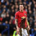 Phil Jones of Manchester United covered in mud during the FA Cup Fourth Round match between Tranmere Rovers and Manchester United, (Photo by Gareth Copley/Getty Images)