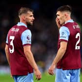 BURNLEY, ENGLAND - NOVEMBER 04: Charlie Taylor and Dara O'Shea of Burnley interact at full-time following their team's defeat in the Premier League match between Burnley FC and Crystal Palace at Turf Moor on November 04, 2023 in Burnley, England. (Photo by Nathan Stirk/Getty Images)