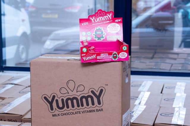 Packed boxes ready for collection by Food Banks at Yummy Foods. Photo: Kelvin Stuttard