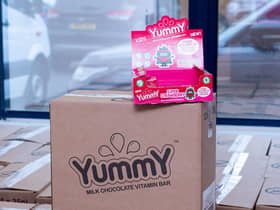 Packed boxes ready for collection by Food Banks at Yummy Foods. Photo: Kelvin Stuttard