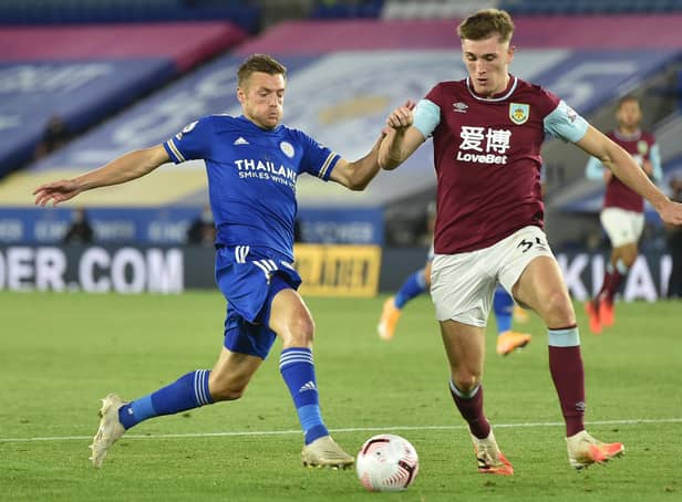 Leicester City's English striker Jamie Vardy (L) vies with Burnley's Irish defender Jimmy Dunne during the English Premier League football match between Leicester City and Burnley at King Power Stadium in Leicester, central England on September 20, 2020. (Photo by PETER POWELL / POOL / AFP)