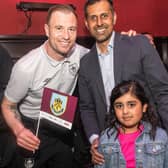 Burnley Council leader Afrasiab Anwar and his daughter Hidayah with Ashley Barnes. ©Andy Ford