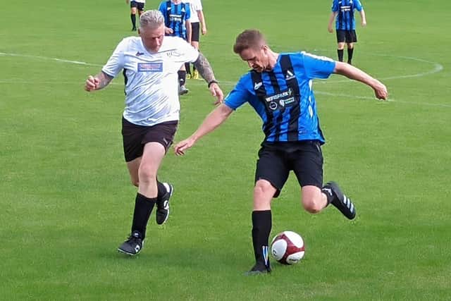Avidly UK take on Parker Plumbing in the Emmaus charity football match in Clitheroe