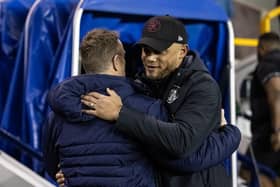 Burnley's manager Vincent Kompany (right) is greeted by Millwall's manager Gary Rowett

The EFL Sky Bet Championship - Millwall v Burnley - Tuesday 21st February 2023 - The Den - London