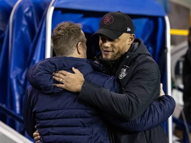 Burnley's manager Vincent Kompany (right) is greeted by Millwall's manager Gary Rowett

The EFL Sky Bet Championship - Millwall v Burnley - Tuesday 21st February 2023 - The Den - London