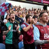 BURNLEY, ENGLAND - MAY 22: Burnley fans show their support prior to the Premier League match between Burnley and Newcastle United at Turf Moor on May 22, 2022 in Burnley, England. (Photo by Gareth Copley/Getty Images)