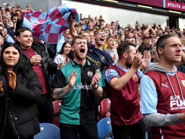 BURNLEY, ENGLAND - MAY 22: Burnley fans show their support prior to the Premier League match between Burnley and Newcastle United at Turf Moor on May 22, 2022 in Burnley, England. (Photo by Gareth Copley/Getty Images)