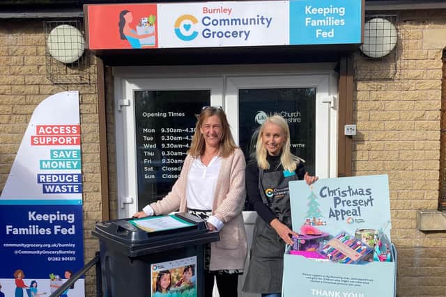 Nicola Larnach, Coordinator at Burnley Together and Daniella Steenbergen, who is the Community Grocery Manager are ready for the launch of the annual Christmas present appeal next week.