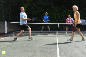 Pickleball players take part in a doubles match in Chorley
