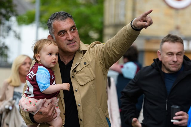 Burnley fans arrive at Turf Moor ahead of the crucial game against Newcastle United. Photo: Kelvin Stuttard