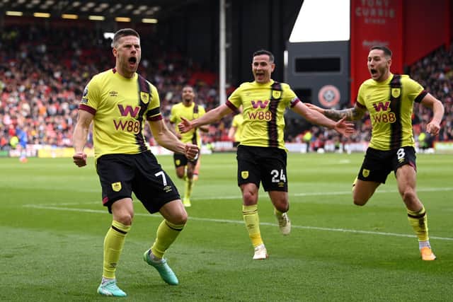 SHEFFIELD, ENGLAND - APRIL 20: Johann Gudmundsson of Burnley celebrates scoring his team's fourth goal  during the Premier League match between Sheffield United and Burnley FC at Bramall Lane on April 20, 2024 in Sheffield, England. (Photo by Stu Forster/Getty Images)