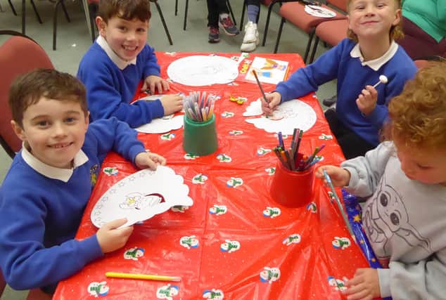 Children enjoying themselves at Mount Zion Church's Christmas crafts session