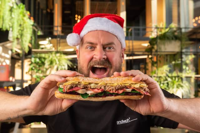 Sandwich extraordinaire Alex Markham who hails from  Burnley, with the 'Ultimate Christmas sndwch'