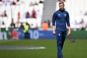 Burnley's English defender and caretaker manager Ben Mee attends the warm up seesion prior to the English Premier League football match between West Ham United and Burnley at the London Stadium, in London on April 17, 2022. - - RESTRICTED TO EDITORIAL USE. No use with unauthorized audio, video, data, fixture lists, club/league logos or 'live' services. Online in-match use limited to 120 images. An additional 40 images may be used in extra time. No video emulation. Social media in-match use limited to 120 images. An additional 40 images may be used in extra time. No use in betting publications, games or single club/league/player publications. (Photo by JUSTIN TALLIS / AFP) / RESTRICTED TO EDITORIAL USE. No use with unauthorized audio, video, data, fixture lists, club/league logos or 'live' services. Online in-match use limited to 120 images. An additional 40 images may be used in extra time. No video emulation. Social media in-match use limited to 120 images. An additional 40 images may be used in extra time. No use in betting publications, games or single club/league/player publications. / RESTRICTED TO EDITORIAL USE. No use with unauthorized audio, video, data, fixture lists, club/league logos or 'live' services. Online in-match use limited to 120 images. An additional 40 images may be used in extra time. No video emulation. Social media in-match use limited to 120 images. An additional 40 images may be used in extra time. No use in betting publications, games or single club/league/player publications. (Photo by JUSTIN TALLIS/AFP via Getty Images)