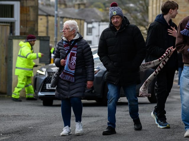 Burnley fans arrive at Turf Moor for the Premier League fixture against Brighton and Hove Albion. Photo: Kelvin Lister-Stuttard