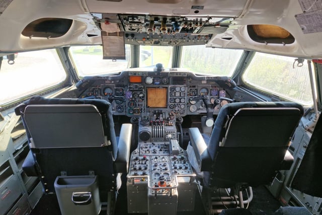 The cockpit of a former passenger jet