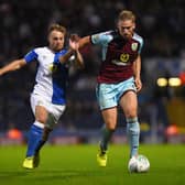 BLACKBURN, ENGLAND - AUGUST 23: Charlie Taylor of Burnley and Harry Chapman of Blackburn in action during the Carabao Cup Second Round match between Blackburn Rovers and Burnley at Ewood Park on August 23, 2017 in Blackburn, England. (Photo by Nathan Stirk/Getty Images)