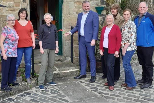 Left to right is Jennifer Beckwith, Stella Bingham and Margaret Brown (Trustees), Andrew Stevenson MP, Molly Clouston (Morris's sister), Julia Snell (Morris's niece), Rebecca Rice (Morris's great niece), Euan Clouston (Morris's nephew).