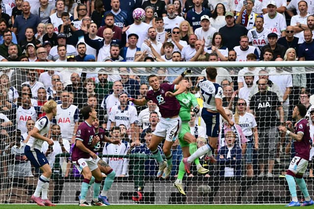 Made two or three good saves, but could have done little about the three goals. Needs to be more dominant dealing with corners though (Photo by BEN STANSALL/AFP via Getty Images)