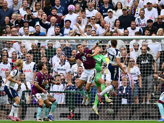 Made two or three good saves, but could have done little about the three goals. Needs to be more dominant dealing with corners though (Photo by BEN STANSALL/AFP via Getty Images)