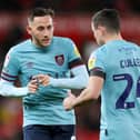 STOKE ON TRENT, ENGLAND - DECEMBER 30: Josh Brownhill and Josh Cullen of Burnley interact during the Sky Bet Championship match between Stoke City and Burnley at Bet365 Stadium on December 30, 2022 in Stoke on Trent, England. (Photo by Charlotte Tattersall/Getty Images)
