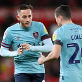 STOKE ON TRENT, ENGLAND - DECEMBER 30: Josh Brownhill and Josh Cullen of Burnley interact during the Sky Bet Championship match between Stoke City and Burnley at Bet365 Stadium on December 30, 2022 in Stoke on Trent, England. (Photo by Charlotte Tattersall/Getty Images)