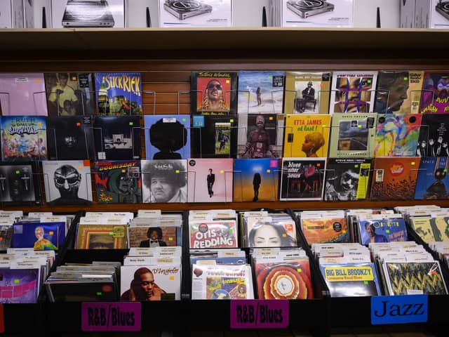 Vinyl records are seen for sale. (Photo credit: ERIC BARADAT/AFP via Getty Images)