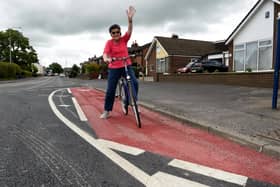 On her bike  - Irene Prescott cycles the entire new cycle lane in Longridge   Photo: Neil Cross