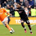 Blackpool's CJ Hamilton vies for possession with  Burnley's Nathan Tella

The EFL Sky Bet Championship - Blackpool v Burnley - Saturday 4th March 2023 - Bloomfield Road - Blackpool