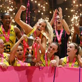 LONDON, ENGLAND - JUNE 05: Laura Malcolm of Manchester Thunder lifts the Vitality Netball Superleague trophy after winning the Netball Superleague Grand Final match between Manchester Thunder and Loughborough Lightning at Copper Box Arena on June 05, 2022 in London, England. (Photo by Alex Broadway/Getty Images for England Netball)