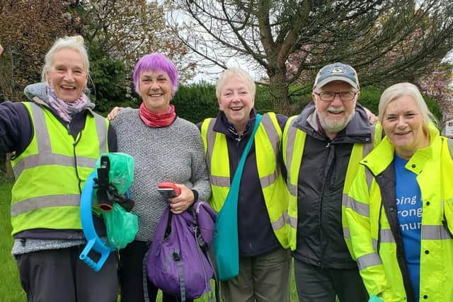 Some of the 'grot grabbers' at Burnley's Ightenhill Park who are celebrating 16 years since the launch of their group devoted to making the park a safe, clean and attractive space for families to enjoy.