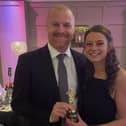 Burnley manager Sean Dyche is presented with his 'Most Incognito Regular' award by Royal Dyche owner Justine Lorriman.